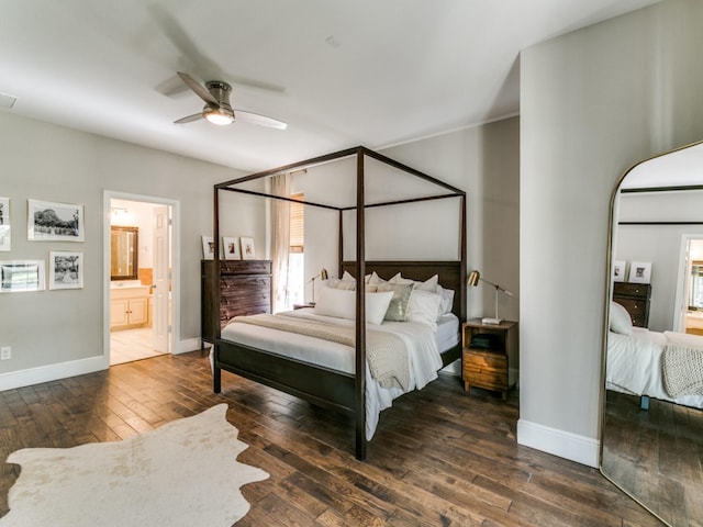 2270 Magic Mantle Dr, Lewisville, TX 75056 - bedroom with hardwood / wood-style floors, baseboards, connected bathroom, and multiple windows
