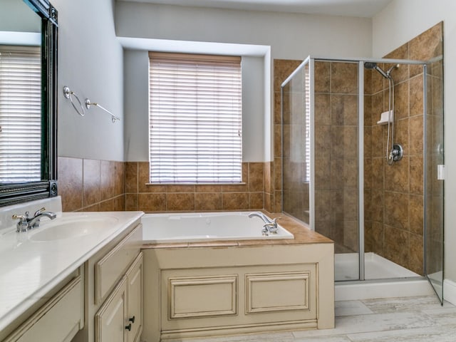 2270 Magic Mantle Dr, Lewisville, TX 75056 - full bath featuring a stall shower, a garden tub, and vanity