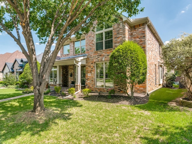 2270 Magic Mantle Dr, Lewisville, TX 75056 - view of front of property with brick siding and a front yard