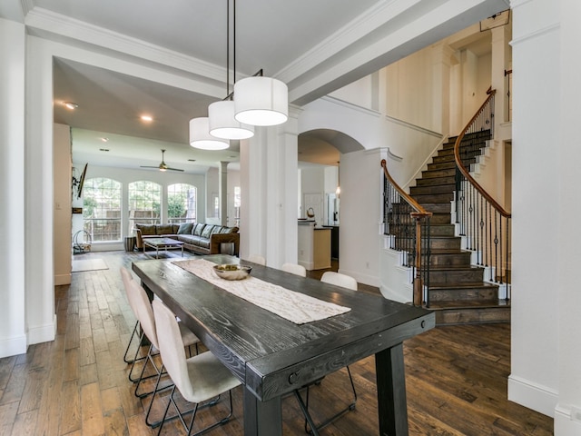 2270 Magic Mantle Dr, Lewisville, TX 75056 - dining area with arched walkways, dark wood-style floors, stairway, a ceiling fan, and recessed lighting