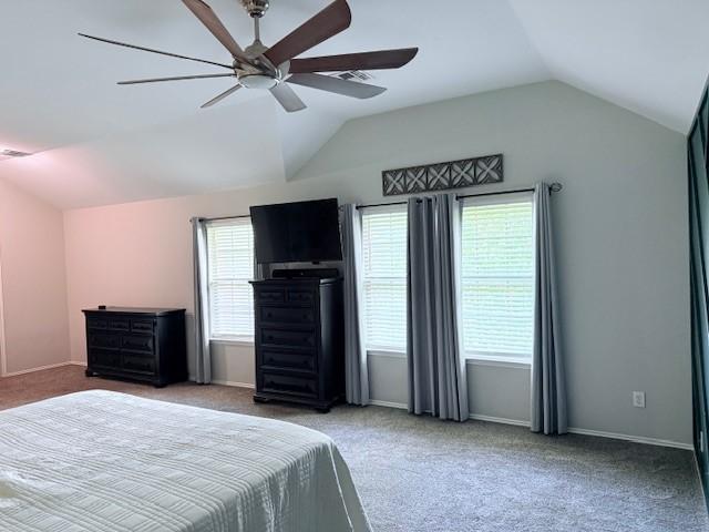 12616 Viewpoint Ln, Fort Worth, TX 76028 - carpeted bedroom featuring vaulted ceiling and a ceiling fan