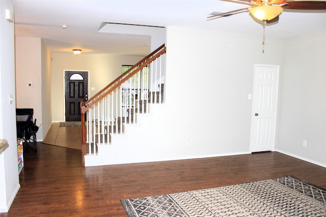 12616 Viewpoint Ln, Fort Worth, TX 76028 - foyer entrance with wood finished floors, ceiling fan, baseboards, and stairway