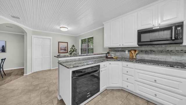 104 Shadowoak Ct, Burleson, TX 76028 - kitchen with black appliances, dark stone counters, white cabinetry, tasteful backsplash, and a peninsula