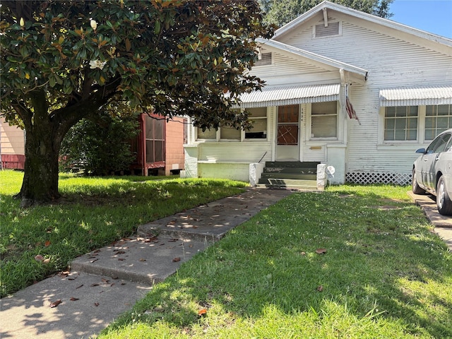 1524 W 59th St, Shreveport, LA 71108 - view of front facade featuring a front lawn and entry steps
