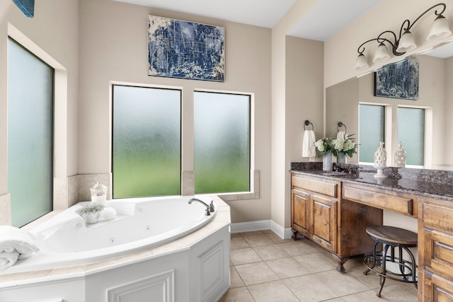 5900 Corinth Chapel Rd, Parker, TX 75002 - bathroom featuring a tub with jets, vanity, tile patterned floors, and baseboards