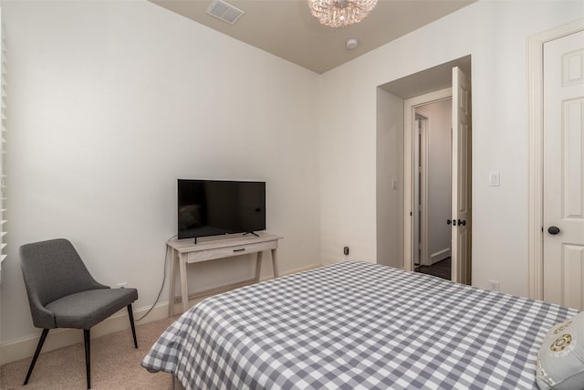 321 Hitch Wagon Dr, Mckinney, TX 75071 - carpeted bedroom featuring baseboards and a chandelier