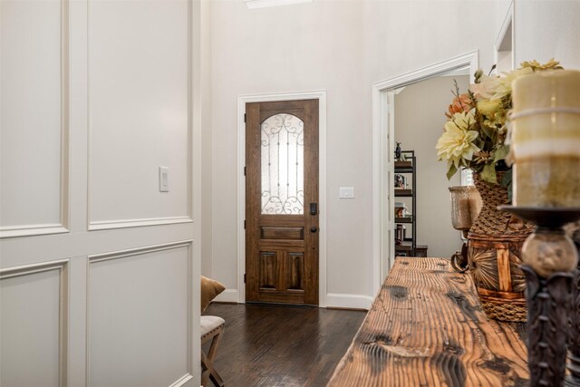 321 Hitch Wagon Dr, Mckinney, TX 75071 - foyer entrance featuring dark wood-style flooring and baseboards