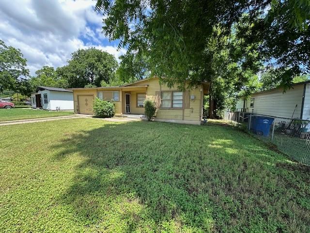 2915 56th St, Dallas, TX 75241 - ranch-style house featuring an attached garage