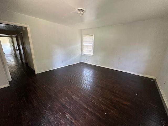 2915 56th St, Dallas, TX 75241 - spare room featuring hardwood / wood-style floors and baseboards