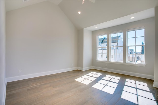 4651 New Water Ln, Dallas, TX 75219 - unfurnished room featuring wood finished floors, baseboards, recessed lighting, and vaulted ceiling