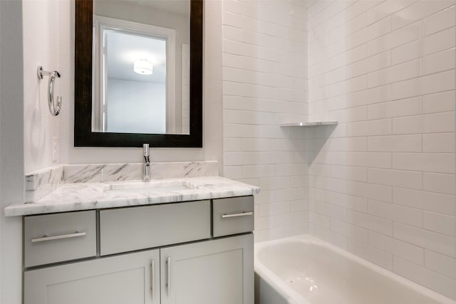 4651 New Water Ln, Dallas, TX 75219 - bathroom featuring vanity and shower / bath combination