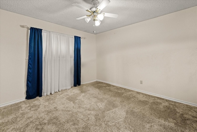 3601 University Dr, Garland, TX 75043 - empty room with carpet floors, a textured ceiling, baseboards, and a ceiling fan