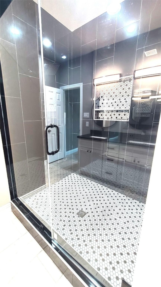 1820 Smoke Tree Ln, Dallas, TX 75253 - bathroom with a shower stall and tile patterned floors