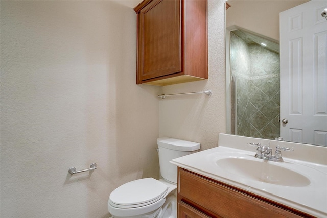 1213 Hackworth St, Roanoke, TX 76262 - full bath with toilet, vanity, a textured wall, and a shower