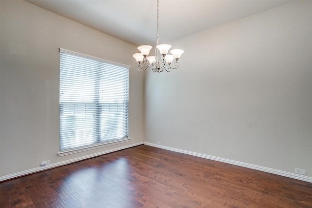 1213 Hackworth St, Roanoke, TX 76262 - unfurnished room with dark wood-style flooring, a chandelier, and baseboards