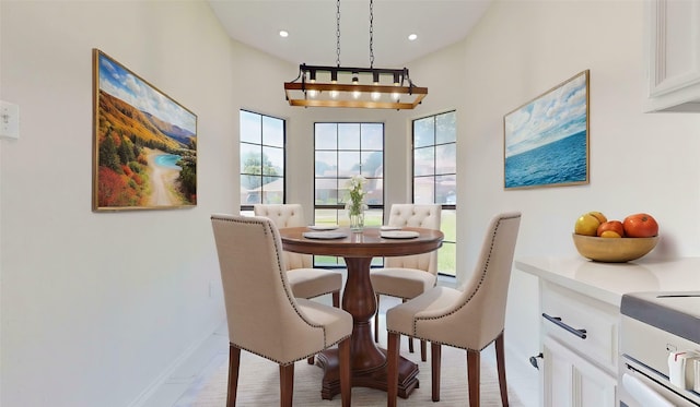 2605 Strother Dr, Garland, TX 75044 - dining area with baseboards and recessed lighting