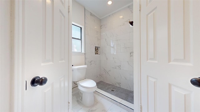 2605 Strother Dr, Garland, TX 75044 - full bath featuring a tile shower, toilet, and marble look tiles