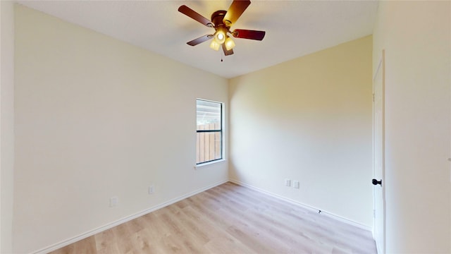 2605 Strother Dr, Garland, TX 75044 - unfurnished room featuring light wood-type flooring, baseboards, and ceiling fan