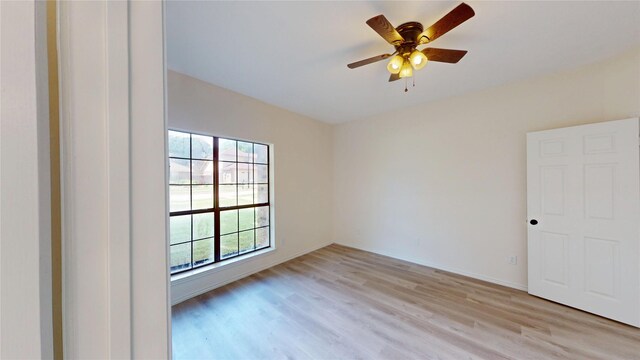 2605 Strother Dr, Garland, TX 75044 - spare room with light wood-style flooring and ceiling fan