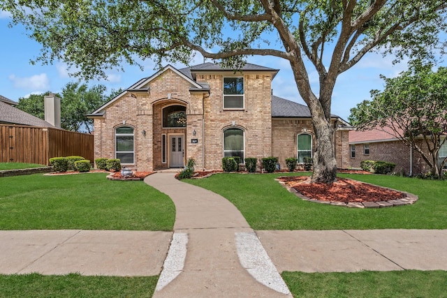 9117 Roundbluff Rd, Plano, TX 75025 - view of front of home featuring brick siding