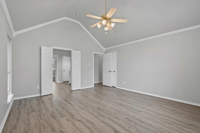 9117 Roundbluff Rd, Plano, TX 75025 - unfurnished bedroom featuring wood finished floors, high vaulted ceiling, ceiling fan, baseboards, and ornamental molding