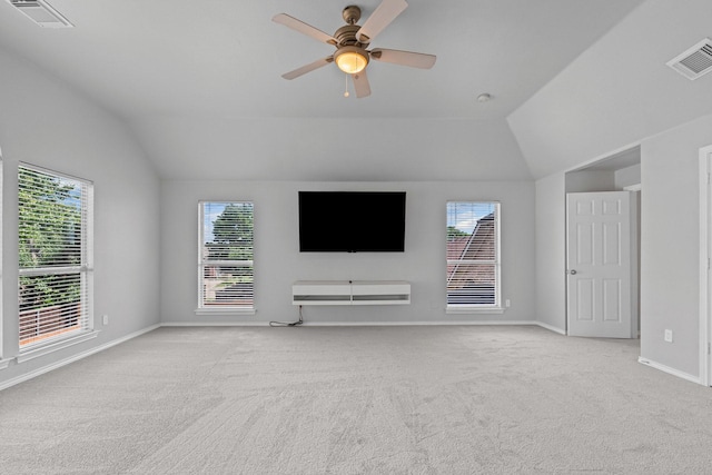 9117 Roundbluff Rd, Plano, TX 75025 - unfurnished living room with vaulted ceiling, carpet, a ceiling fan, and baseboards
