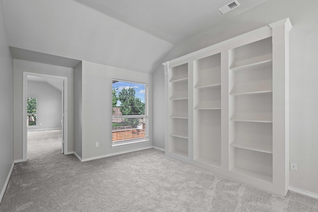 9117 Roundbluff Rd, Plano, TX 75025 - carpeted empty room with lofted ceiling and baseboards