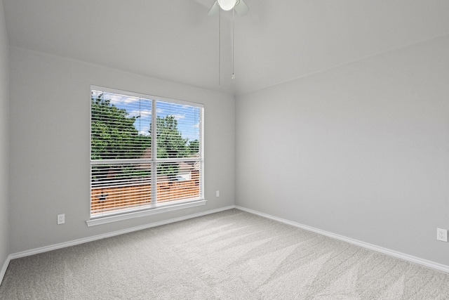 9117 Roundbluff Rd, Plano, TX 75025 - carpeted empty room with baseboards and ceiling fan