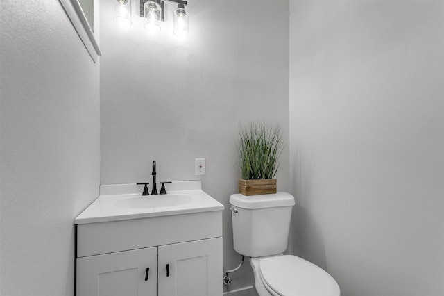 4423 Harvey Dr, Mesquite, TX 75150 - half bathroom featuring toilet and vanity