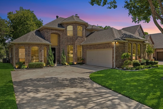 5516 Greenview Ct, North Richland Hills, TX 76148 - french country style house with brick siding, a garage, a shingled roof, driveway, and a front yard