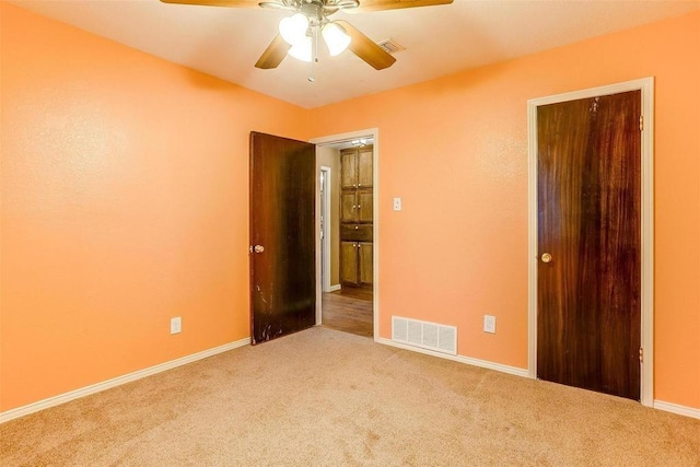 4428 Aspen Way, Haltom City, TX 76137 - unfurnished bedroom with carpet floors, baseboards, and ceiling fan