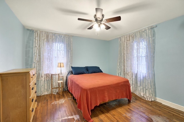 7932 Tumbleweed Trl, White Settlement, TX 76108 - bedroom with hardwood / wood-style floors, baseboards, and a ceiling fan