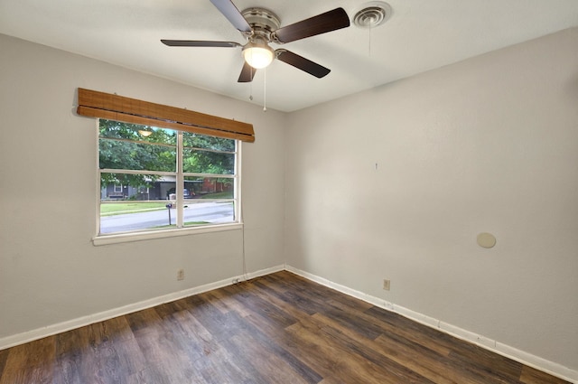 7932 Tumbleweed Trl, White Settlement, TX 76108 - spare room with baseboards, dark wood-style floors, and a ceiling fan