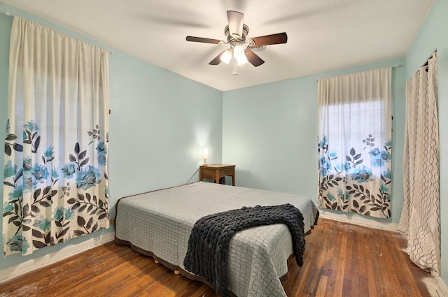 7932 Tumbleweed Trl, White Settlement, TX 76108 - bedroom featuring wood-type flooring and a ceiling fan