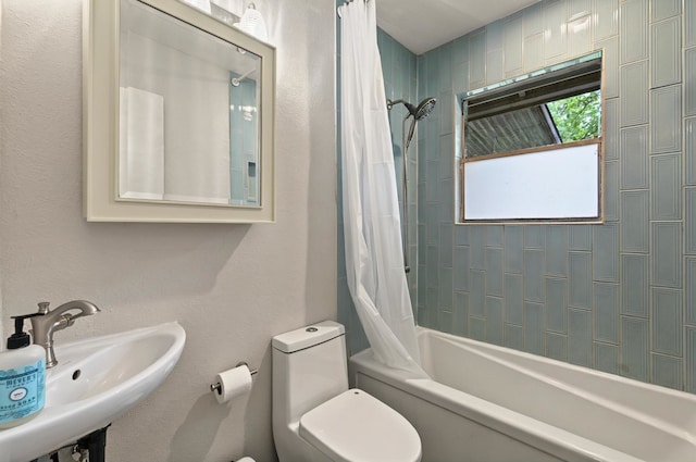 7932 Tumbleweed Trl, White Settlement, TX 76108 - bathroom featuring a sink, toilet, and shower / bathtub combination with curtain