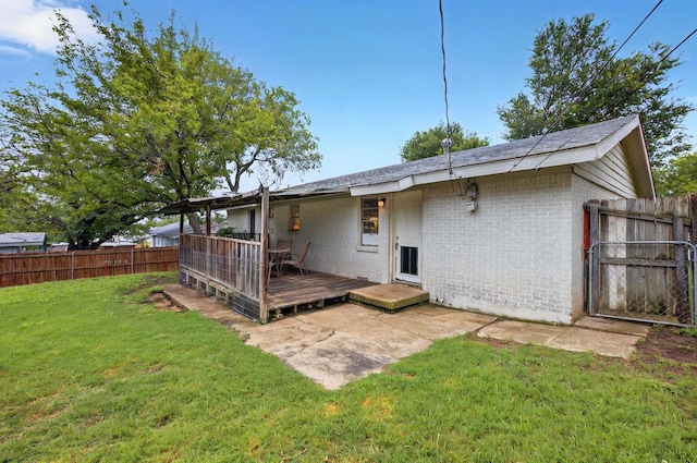7932 Tumbleweed Trl, White Settlement, TX 76108 - rear view of property with brick siding and a deck