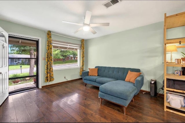 7932 Tumbleweed Trl, White Settlement, TX 76108 - living area featuring healthy amount of natural light, hardwood / wood-style flooring, a ceiling fan, and baseboards