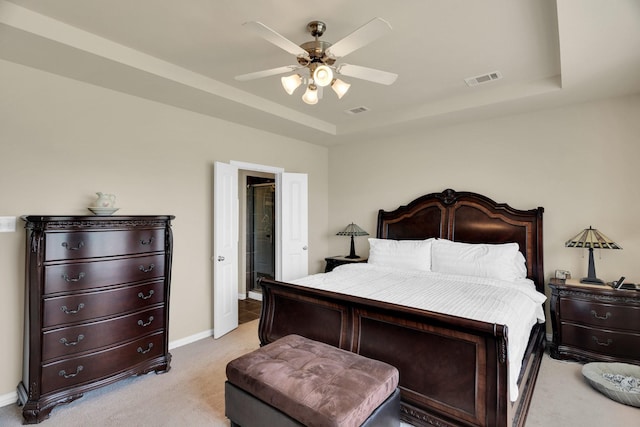 136 Devonshire Dr, Waxahachie, TX 75167 - bedroom with a tray ceiling, light colored carpet, baseboards, and ceiling fan