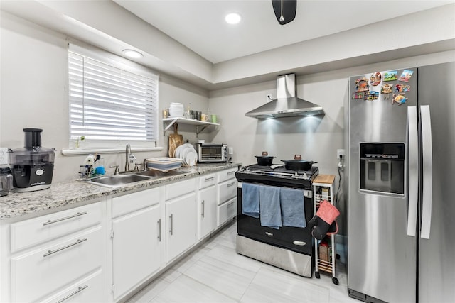420 Shady Oaks Ln, Paris, TX 75460 - kitchen with stainless steel appliances, a sink, wall chimney range hood, white cabinets, and open shelves
