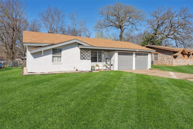 420 Shady Oaks Ln, Paris, TX 75460 - view of front of house with brick siding, a garage, and driveway