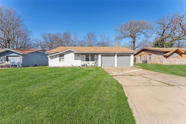 420 Shady Oaks Ln, Paris, TX 75460 - ranch-style home with an attached garage, concrete driveway, a front yard, and brick siding