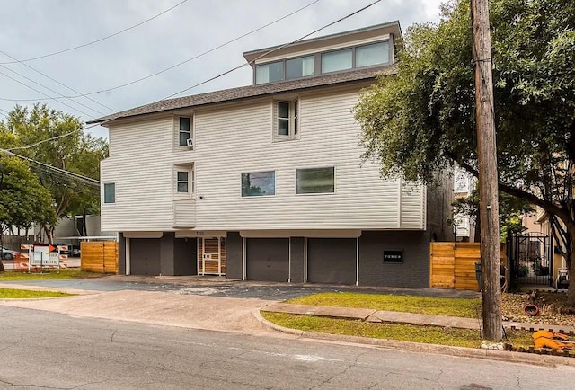 5105 Vandelia St, Dallas, TX 75235 - view of front of house with driveway and an attached garage