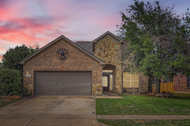 1017 Oarlock Dr, Crowley, TX 76036 - view of front of property with stone siding, concrete driveway, a garage, and brick siding