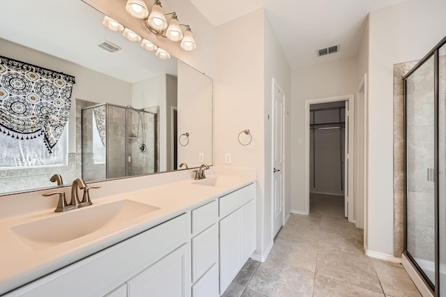 1017 Oarlock Dr, Crowley, TX 76036 - full bath featuring a shower stall, double vanity, and tile patterned flooring