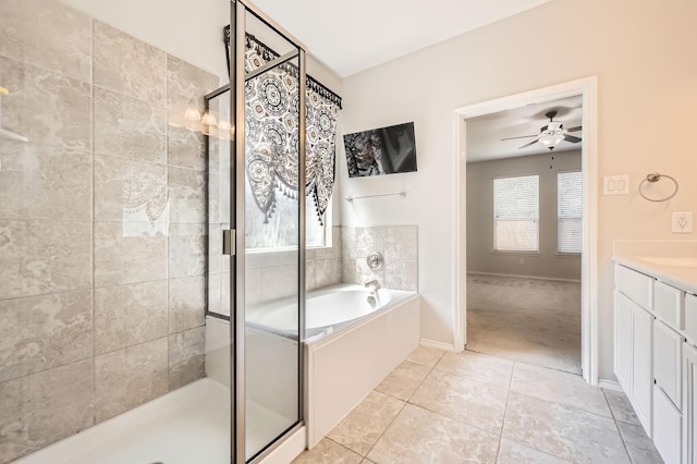 1017 Oarlock Dr, Crowley, TX 76036 - full bathroom featuring ceiling fan, a garden tub, tile patterned floors, and a stall shower