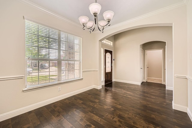 1017 Oarlock Dr, Crowley, TX 76036 - spare room featuring arched walkways, plenty of natural light, a chandelier, ornamental molding, and wood-type flooring
