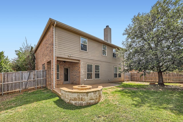 1017 Oarlock Dr, Crowley, TX 76036 - rear view of house featuring a chimney, an outdoor fire pit, brick siding, and a patio area
