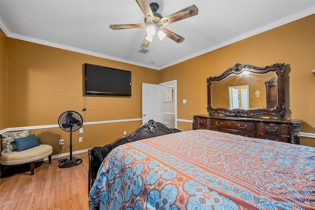 209 Keswick Dr, Hewitt, TX 76643 - bedroom with wood finished floors, ornamental molding, baseboards, and a ceiling fan