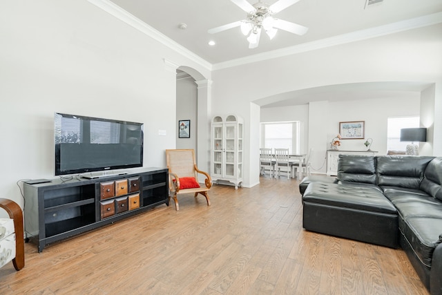 1415 Clubhill Dr, Rockwall, TX 75087 - living area with arched walkways, ceiling fan, ornamental molding, light wood-style floors, and recessed lighting