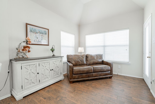 1415 Clubhill Dr, Rockwall, TX 75087 - living area featuring dark wood-style flooring, lofted ceiling, and baseboards